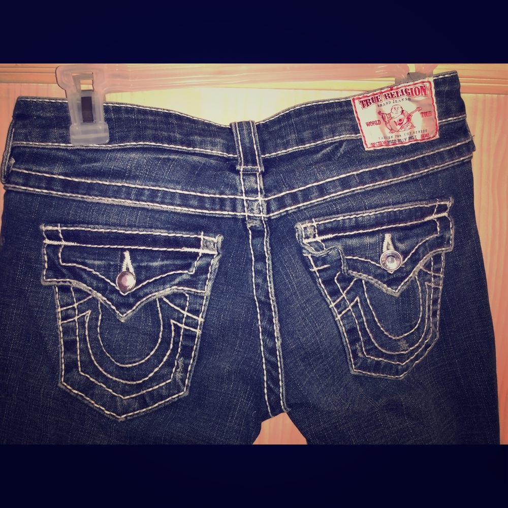 TRUE RELIGION jeans with super blingy buttons.